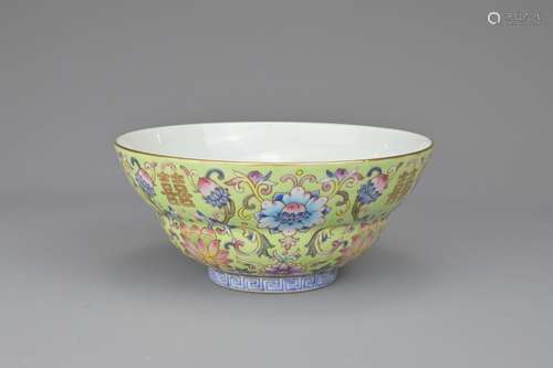 A CHINESE LIME-GREEN GROUND FAMILLE ROSE PORCELAIN OGEE FORM...