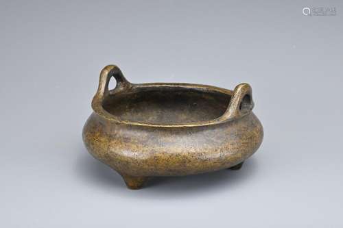 A CHINESE BRONZE TRIPOD CENSER