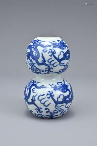 A CHINESE BLUE AND WHITE PORCELAIN DOUBLE-GOURD DRAGON, MARK...