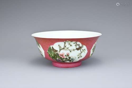 A CHINESE RUBY GROUND FAMILLE ROSE SGRAFFITO PORCELAIN BOWL,...