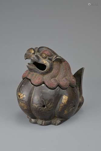 A CHINESE BRONZE LION CENSER