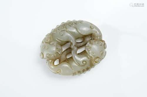 A CHINESE CELADON JADE LION GROUP