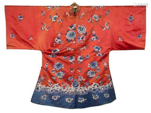 A CHINESE RED GROUND SILK EMBROIDERED ROBE, LATE QING DYNAST...