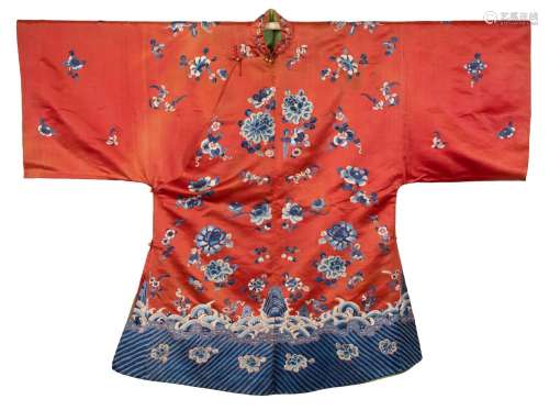 A CHINESE RED GROUND SILK EMBROIDERED ROBE, LATE QING DYNAST...