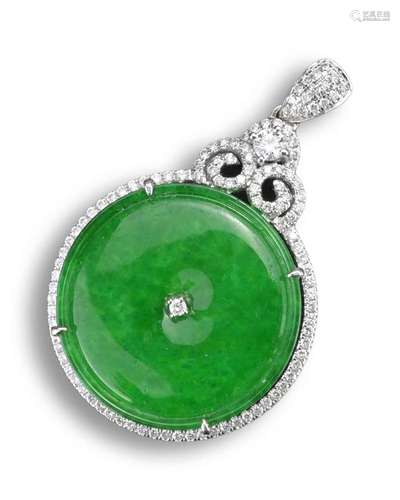 AN 18KT WHITE GOLD, DIAMOND AND JADEITE CIRCULAR SHAPED PEND...