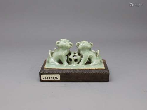 A Longquan Celadon 'Lions' Brushrest, Ming dynasty明 龙泉窑青...