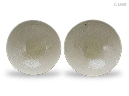A Pair of Qingbai Bowls moulded with Phoenixes, Southern Son...
