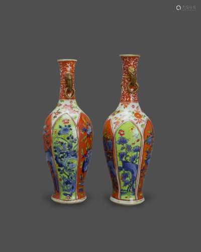 A Pair of 'Clobbered' Blue and White Vases, Kangxi Period 清...