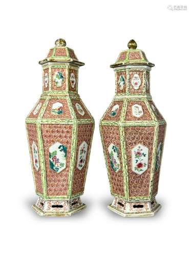 An Unusual Pair of Moulded 'famille rose' Vases and Covers, ...