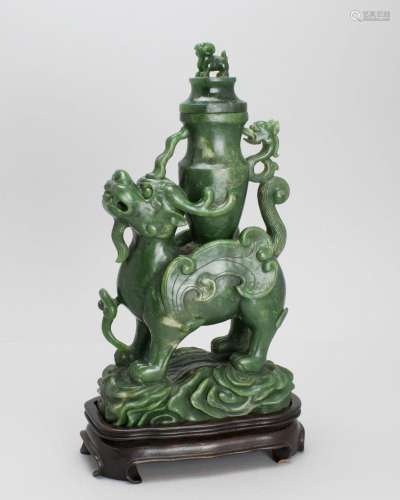 A spinach green Jade Qilin Vase and Cover, 20th century 20世...