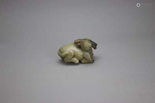 A Jade seated Buffalo, c. 1920, in Ming style 约1920年 仿明式...