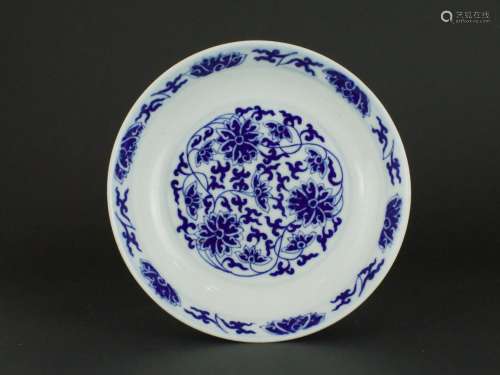 A Blue and White Lotus Scroll Dish, six character mark of Gu...