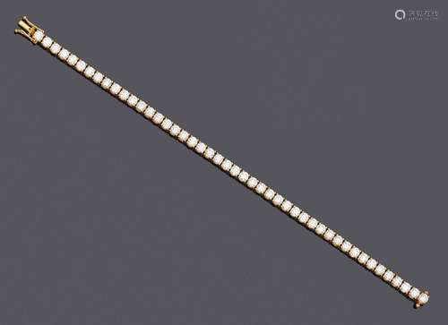 BRACELET EN DIAMANT.Or rose 750, 14g.Bracelet classique et é...