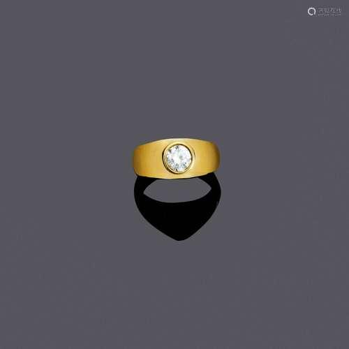 BAGUE HOMME EN DIAMANT.Or jaune 750, 14g.Bague gainée sporti...