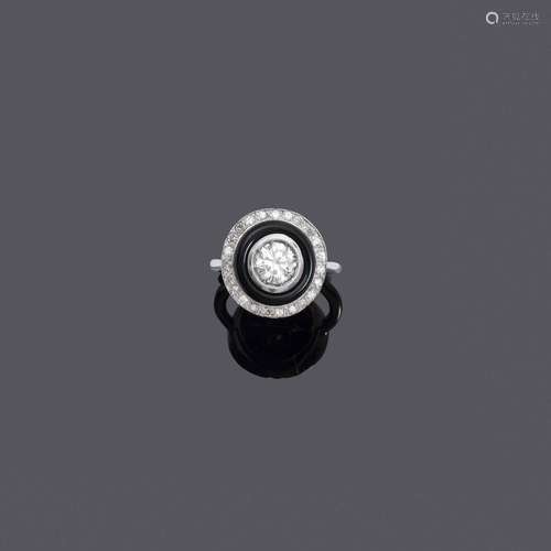 BAGUE EN DIAMANT ONYX.Or blanc 750 et argent 925, 6g.Bague a...