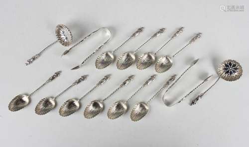 A set of six late Victorian silver apostle teaspoons, matchi...