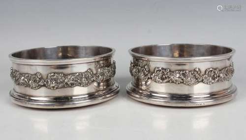 A pair of late Victorian Elkington & Co plated wine coas...