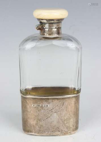 A George V silver, cut glass and ivory hip flask, the facet ...