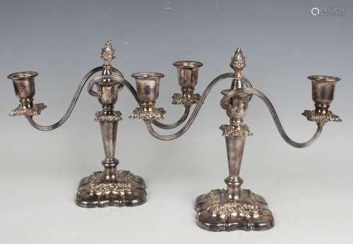 A pair of 20th century plated twin scroll branch candelabra,...