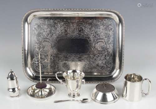 A George V silver hatpin and ring stand, on a circular dish ...