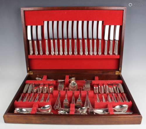 A canteen of plated cutlery, comprising twelve table knives ...