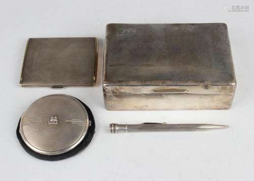 A George V silver rectangular cigarette box with engine turn...