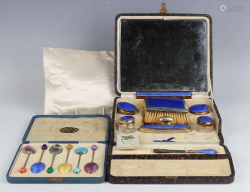 An Art Deco silver gilt and blue enamelled part manicure set...