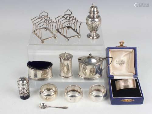 A small group of silver, including napkin rings and condimen...