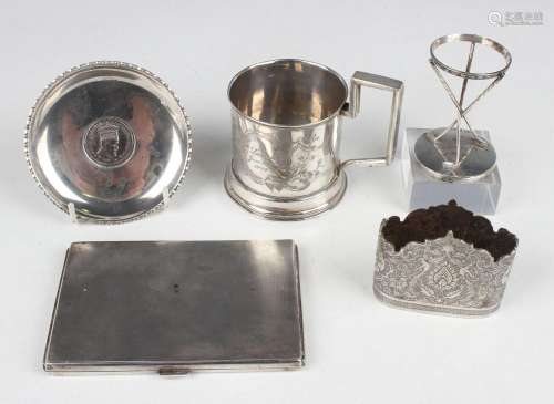 A small group of silver, comprising a cigarette case, Birmin...