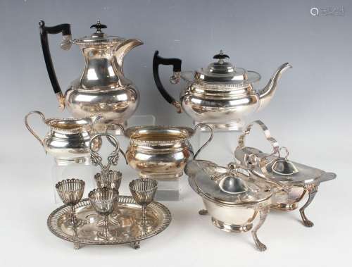 A collection of assorted plated items, including a pair of s...