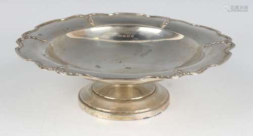 A George V silver circular tazza, the shaped rim cast with b...