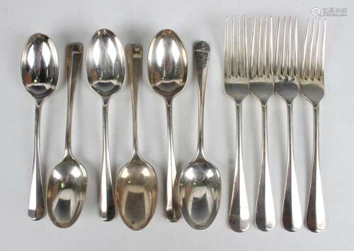 A matched set of six George V silver rat tail dessert spoons...