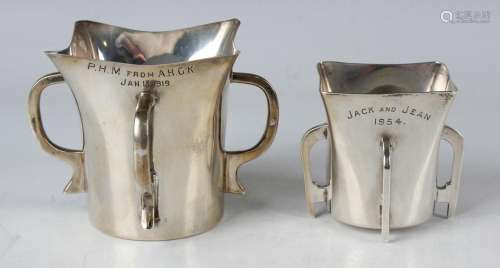 Two Edwardian silver graduated mether cups, each with square...