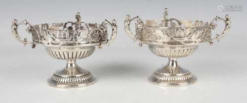A pair of George III silver three-handled dessert dishes, ea...