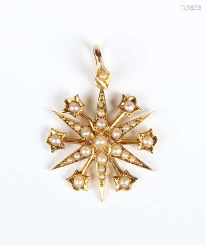An Edwardian gold and seed pearl pendant, designed as a six ...