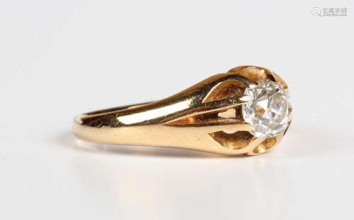 An 18ct gold and diamond single stone ring, claw set with a ...