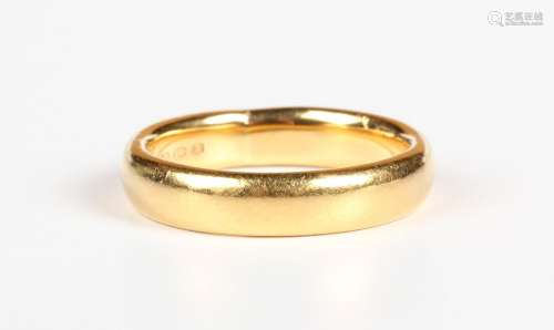 A 22ct gold wedding ring, Birmingham 1922, weight 7.7g, ring...