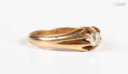 An 18ct gold and diamond single stone ring, claw set with a ...
