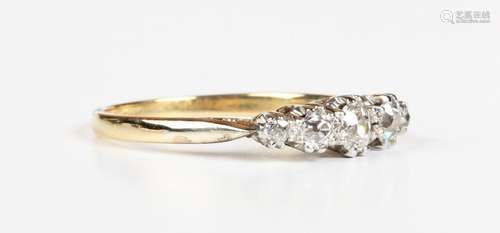 A gold and diamond five stone ring, claw set with a row of c...