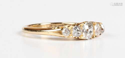 An 18ct gold and diamond five stone ring, mounted with a row...