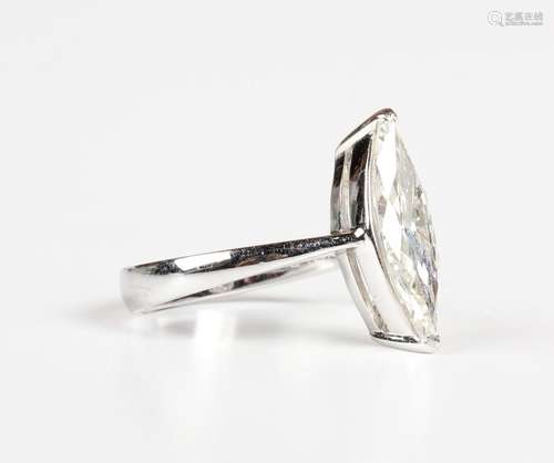 An 18ct white gold and diamond single stone ring, mounted wi...