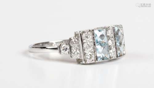 A platinum, aquamarine and diamond ring, mounted with four s...