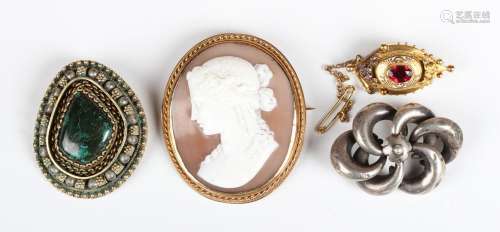 A gold mounted oval shell cameo brooch, 19th century, probab...