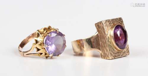 A 9ct gold ring, collet set with an oval cut amethyst on a r...