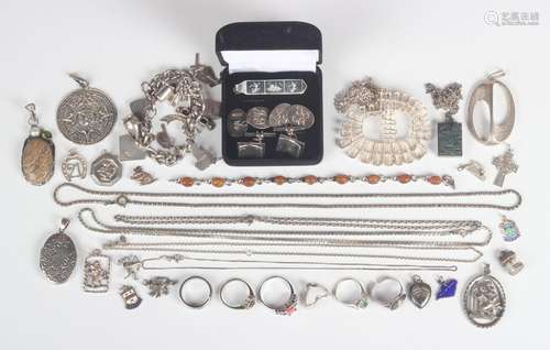 A group of silver and silver mounted jewellery, comprising a...