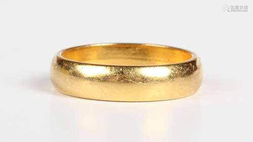 A 22ct gold wedding ring, Birmingham 1942, weight 7.1g, ring...