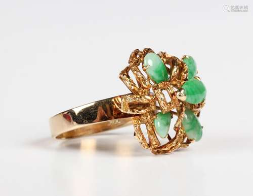 An Asian gold and jade ring, mounted with five pear shaped j...