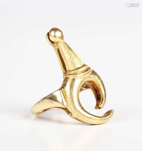 A Lalaounis gold ring of symbolic design, detailed '750', we...