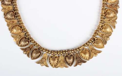 A Victorian gold necklace in a Classical Revival design, the...