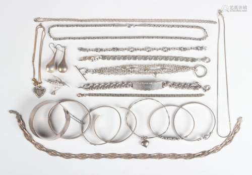 A group of silver jewellery, comprising seven bangles, five ...